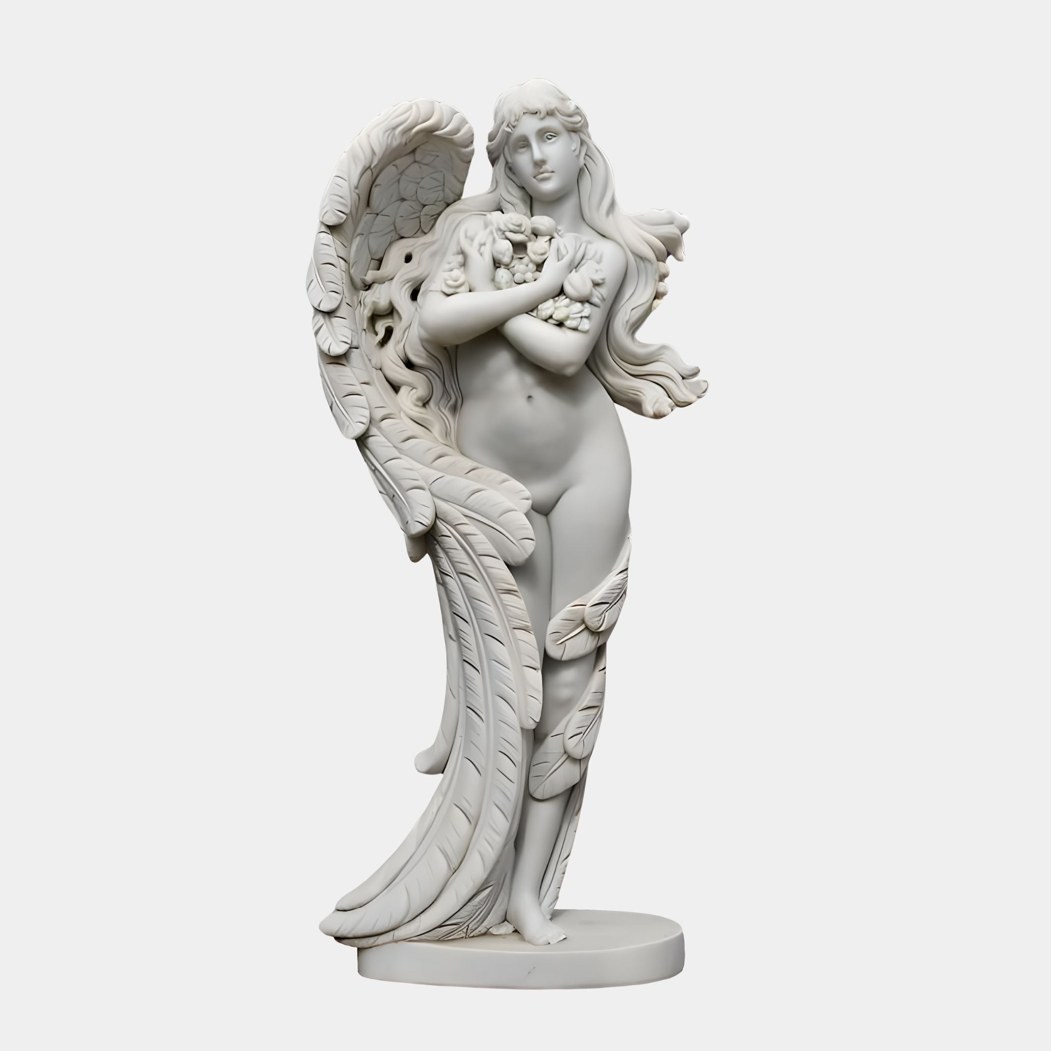 The Leafy Embrace Angel Marble Outdoor Sculpture by Giant Sculptures depicts a 170cm female angel with long hair, serene expression, and leaf-inspired wings. Nestled in nature, she holds flowers to her chest, showcasing intricate feather details and flowing curves that embody spirituality.