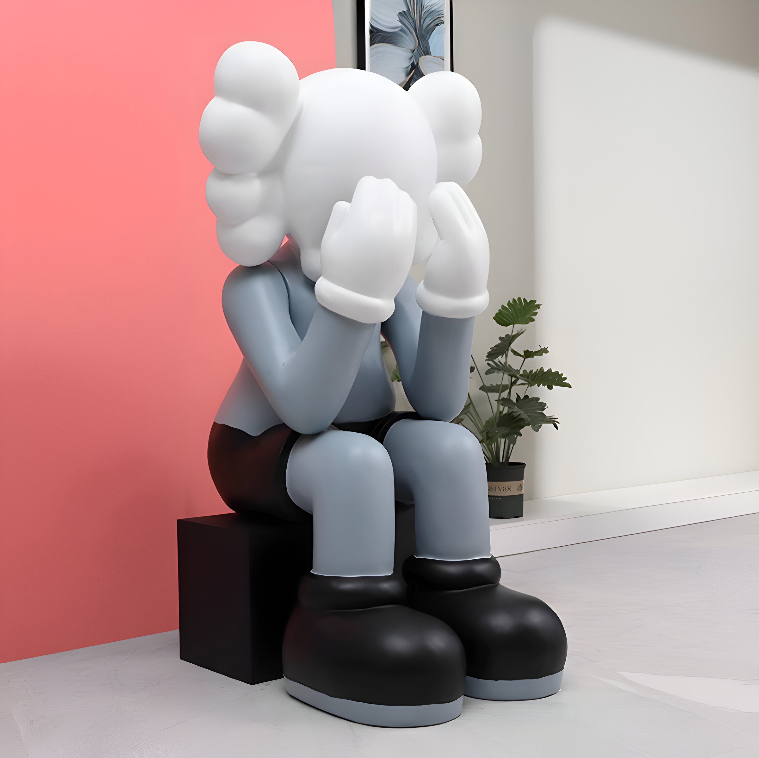 Soft Grey Iconify sitting sculpture, side view, displaying calm and balance in modern artistic design.