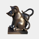 The Affectionate Cat Pair Marble Outdoor Sculpture by Giant Sculptures features a polished black cat duo, their intertwined tails forming a loop on a rectangular base. Their sleek lines and smooth finish create an elegant design, perfect for enhancing any outdoor setting. Size: 40cm.