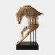 Rising Stallion Wood Horse Sculpture by Giant Sculptures shown from the side, layered horizontal wood slabs forming an abstract rearing horse on a black base.