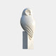 The Minimalist Perched Owl Marble Outdoor Sculpture by Giant Sculptures features a smooth, stylized owl with engraved eyes and wing lines on a rectangular pedestal, enhancing contemporary outdoor decor with its elegant simplicity.