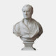 The Giant Sculptures Isaac Newton Marble Bust Sculpture (75cm) features a white marble figure of Newton with short hair and classical robes, his name inscribed on the pedestal. The sculpture stands out against a plain white background.