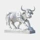 The 150cm Powerful Bull White Marble Outdoor Sculpture by Giant Sculptures features an abstract bull with exaggerated muscles and a strong, dynamic forward pose, capturing remarkable energy and strength on its pedestal.