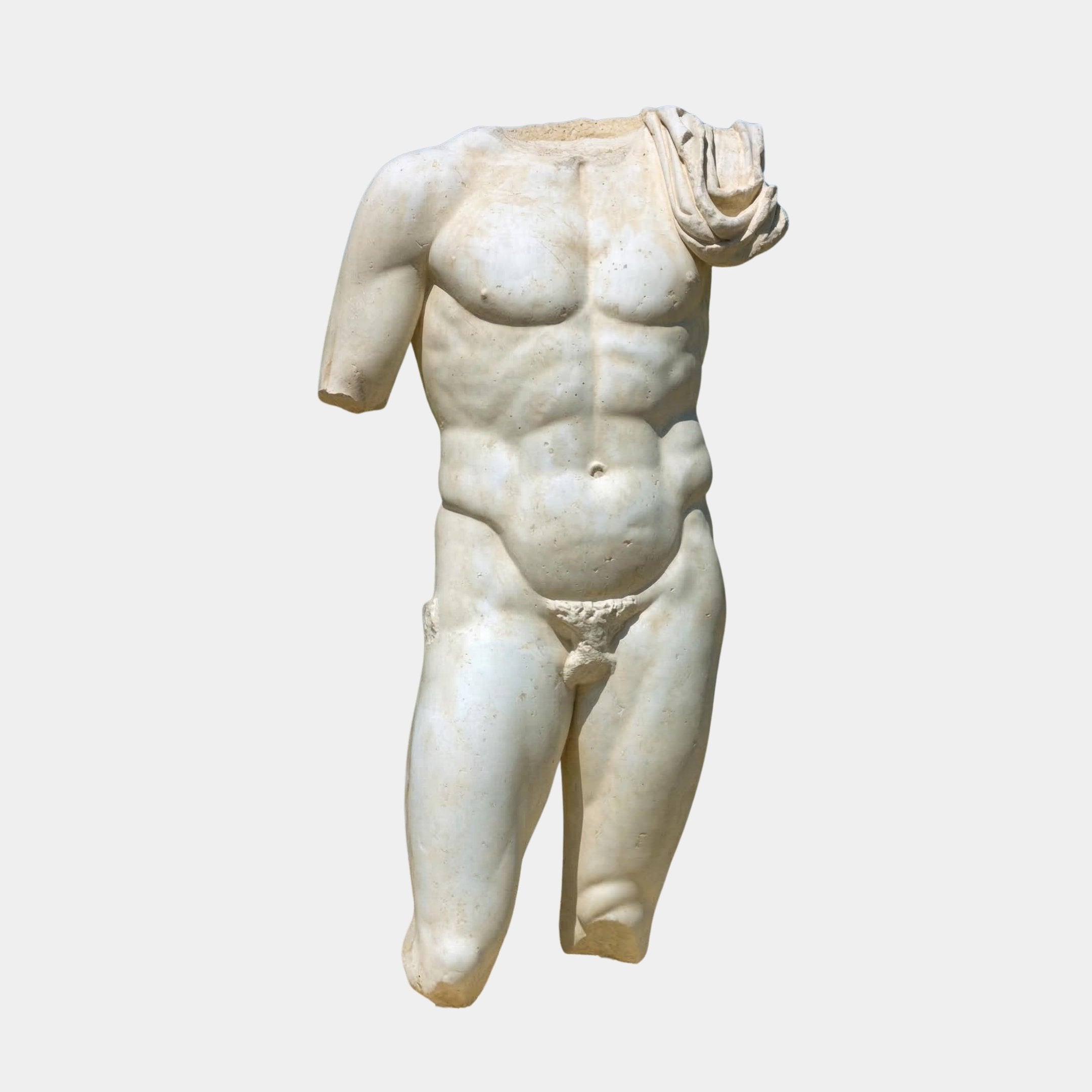 The Classical Male Marble Torso Sculpture - 130cm by Giant Sculptures is a natural white marble piece, headless and armless with draped cloth over one shoulder, shown on a plain white background.