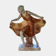Dancing Woman Marble Sculpture by Giant Sculptures, 120cm, depicting a figure in white marble lifting a swirling brown and amber dress, on a pale base.