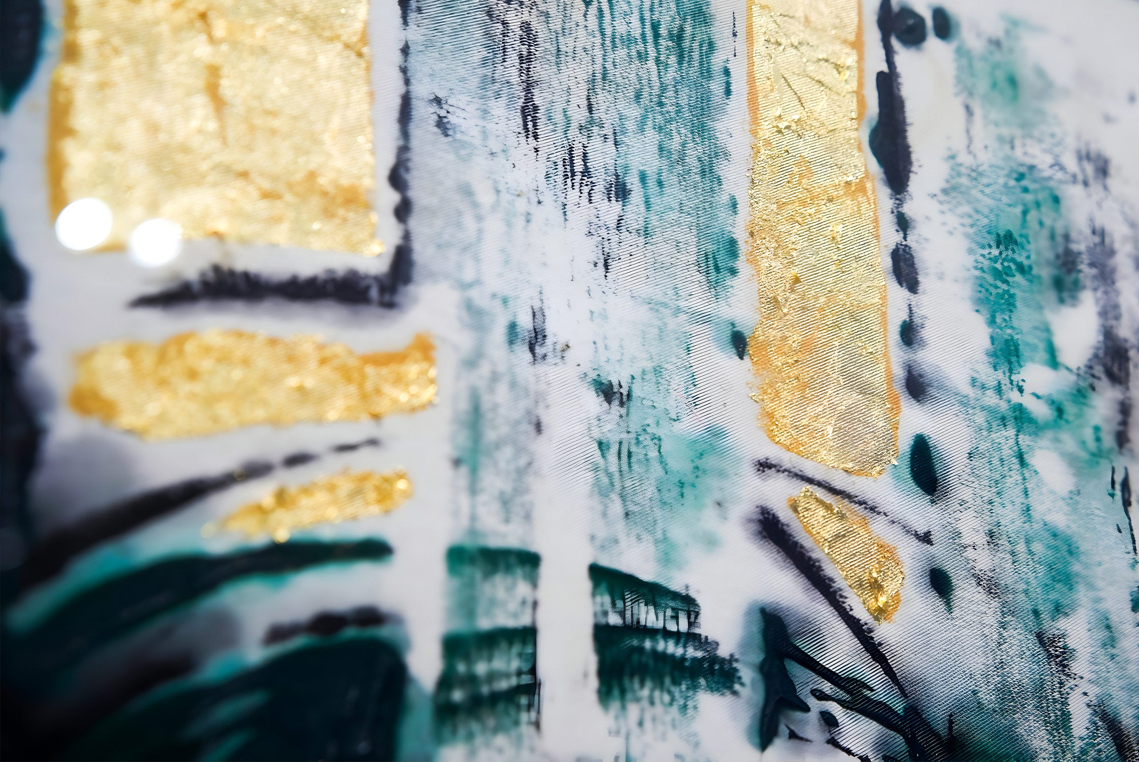 Abstract painting with textured gold and teal brush strokes on a white background. Rectangular gold shapes create a contrast with the dark teal and black strokes, giving a dynamic and layered appearance.