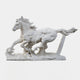 The Running Horse White Marble Outdoor Sculpture by Giant Sculptures is a 120cm piece showcasing a galloping horse with a flowing mane and muscular build. Its racing stance on the base evokes dynamic energy and movement.