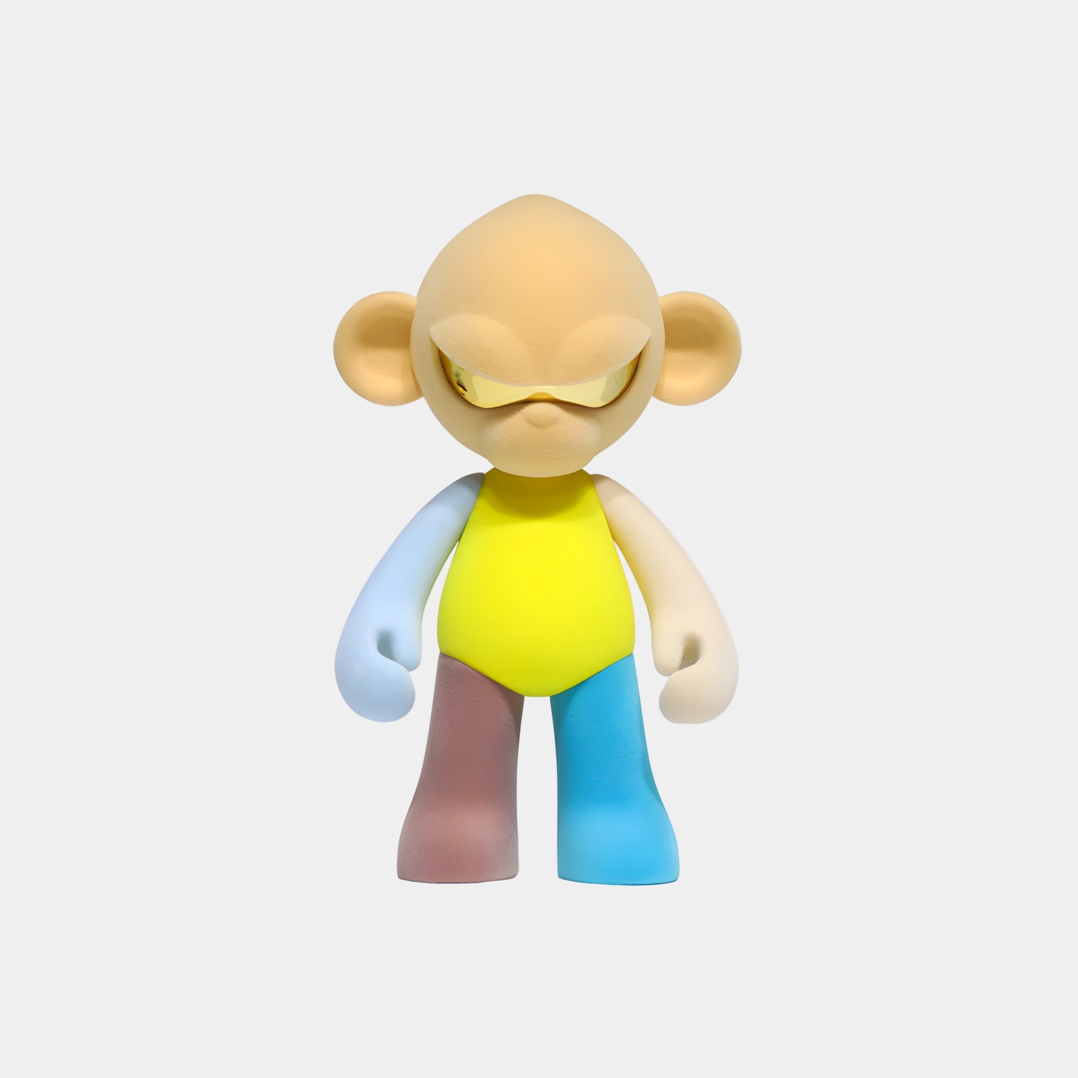 The Giant Sculptures Warm Beige Head II Colorblock Monkey Figure (35cm) is a collectible resin sculpture with a yellow body, warm beige head, big ears, blue and white arms, and brown and blue legs against a light gray background.
