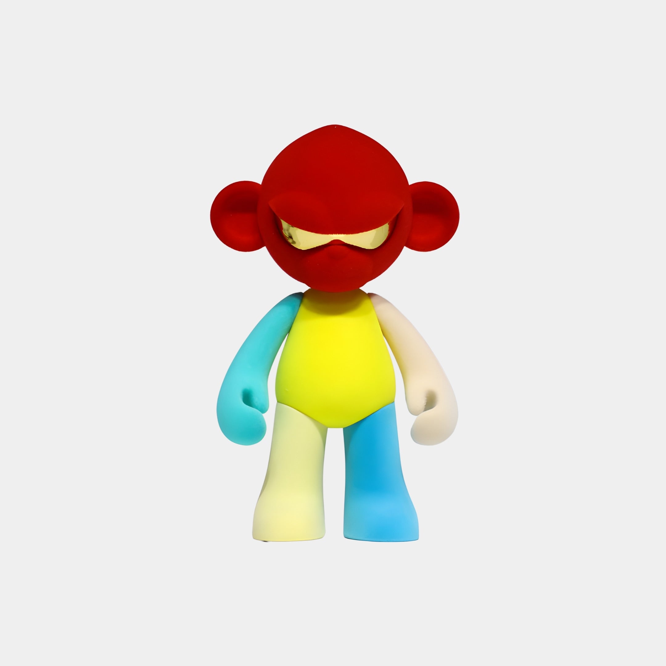The Red Head II Colorblock Monkey Figure by Giant Sculptures stands 35cm tall with a red head, gold visor, colorful limbs, and yellow chest—a striking collectible crafted from premium resin on a plain white background.