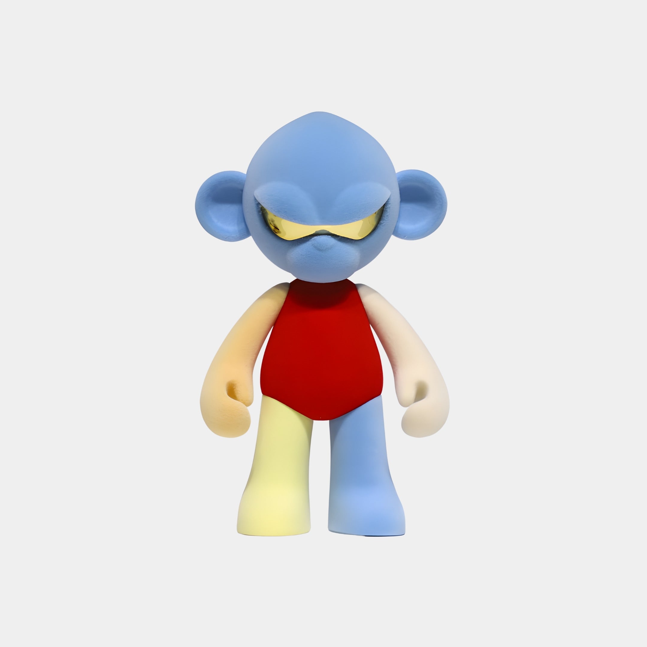 The Giant Sculptures Blue Head Colorblock Monkey Figure - 35cm features a blue head, gold visor, red bodysuit, and colorful mismatched limbs. This striking resin collectible stands out against a plain white background.