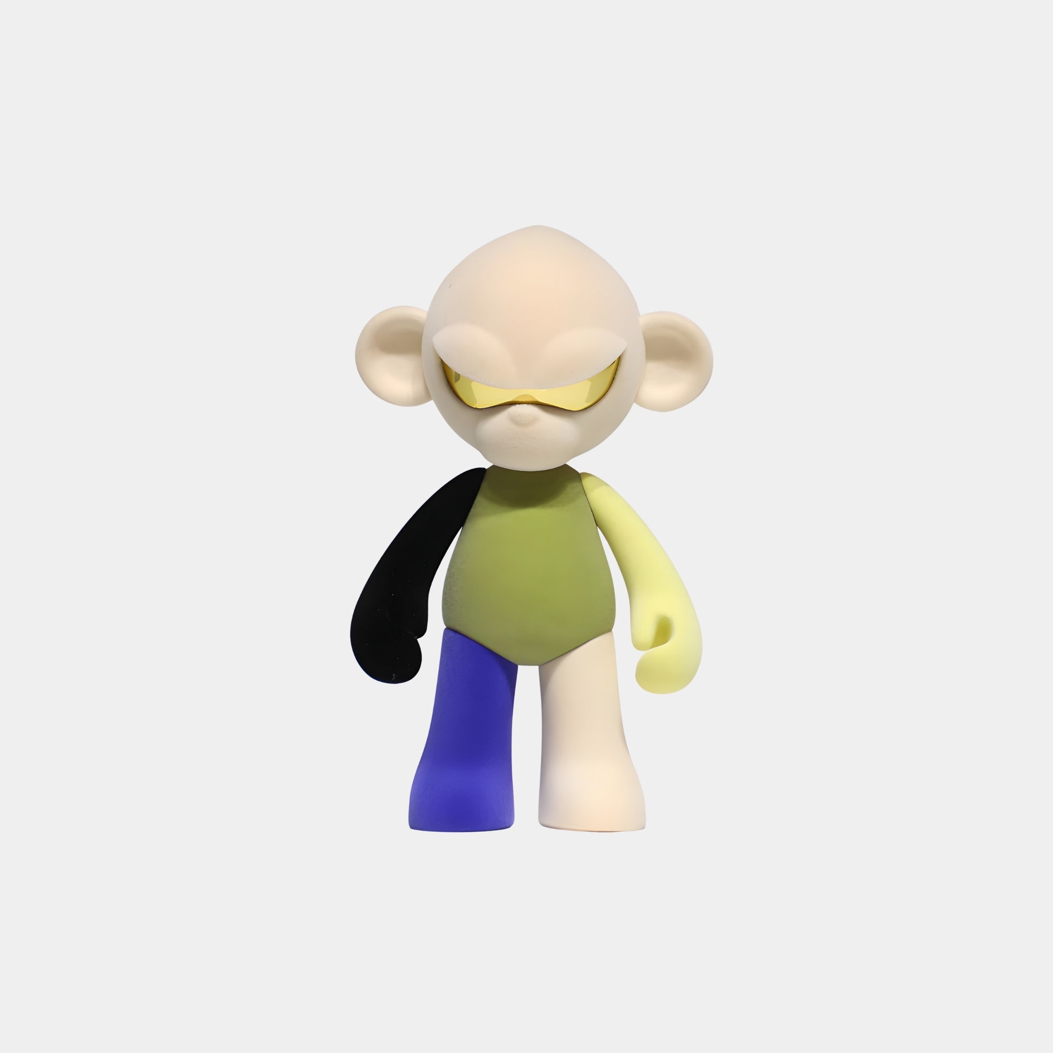 The Cream Head I Colorblock Monkey Figure (15cm) by Giant Sculptures features yellow sunglasses, a green body, and multi-colored limbs, making it a collectible sculpture displayed against a plain white background.