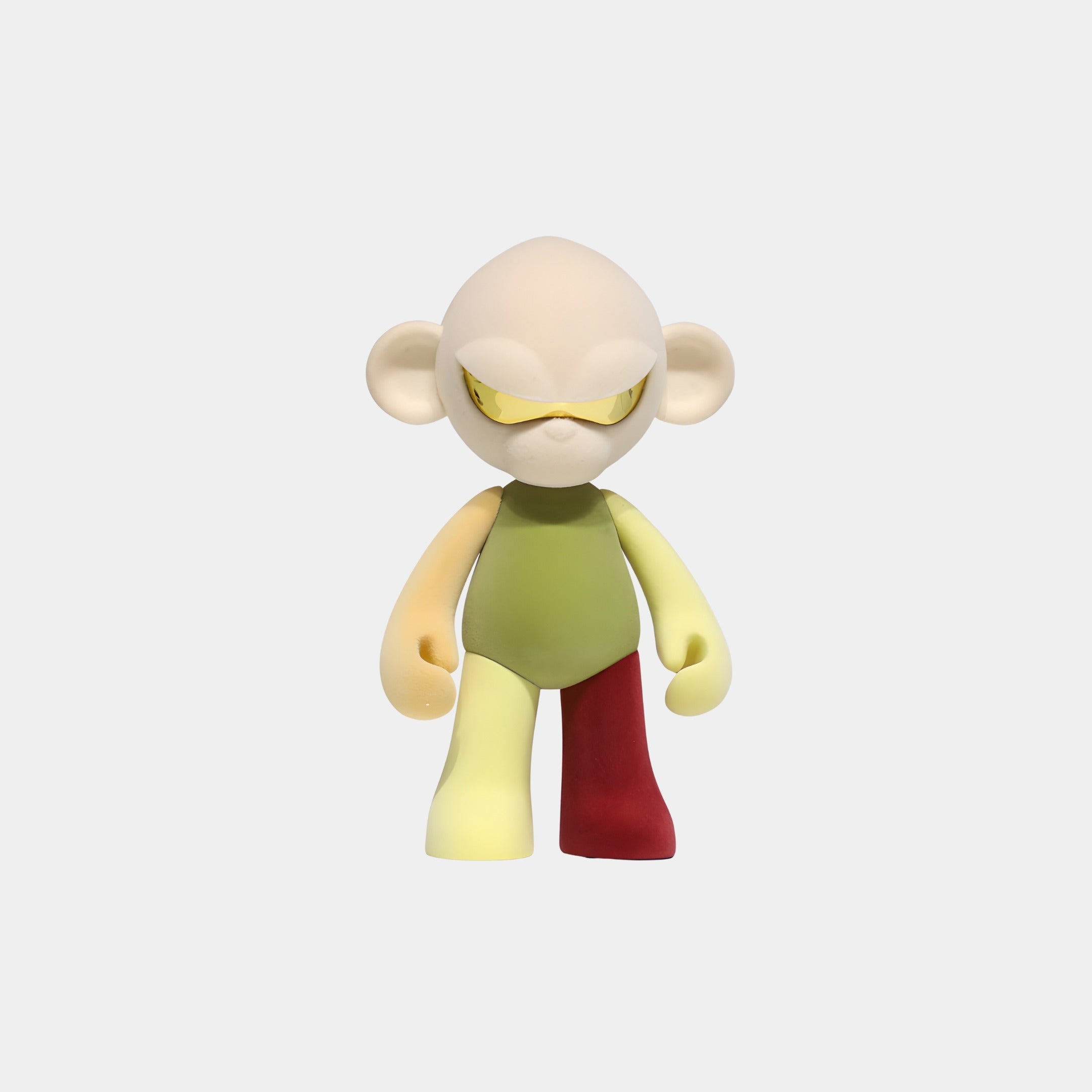 The Cream Head IV Colorblock Monkey Figure - 15cm by Giant Sculptures is a resin collectible with large ears, yellow glasses, a green bodysuit, and mismatched limbs—shown on a plain white background.