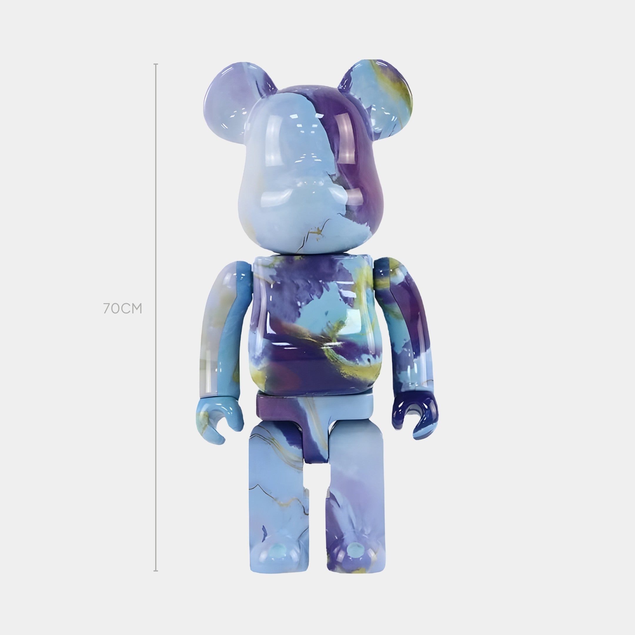 The Abstract Swirl Bear Sculpture - 70cm by Giant Sculptures features smooth, glossy blue, purple, and yellow marble-like patterns. Standing upright against a white background, it captures the essence of contemporary art.
