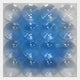 The Dromara Sky Blue Fade Acrylic Square 3D Wall Art by Giant Sculptures features 16 clear, dome-shaped lenses on a blue and white base, reflecting ceiling lights to create a modern pattern of light and shadow.