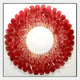 Maravue Ruby Red Petal Cluster Acrylic 3D Wall Art by Giant Sculptures, a circular wreath-like bloom of glossy ruby petals on a white square panel.