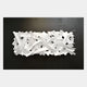 Stravira Black I Sculptural White Metal 3D Wall Art featuring interwoven white iron strips layered over a black background, viewed from the front.