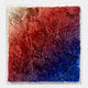 Auralith Rouge-Blue Fade Layered Leather & Acrylic 3D Wall Art featuring hand-shaped petal-like leather layers transitioning from ivory and red through plum to cobalt blue, mounted in an acrylic frame on a light wall.