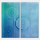 Cirquora Blue I Gradient Ripple Diptych Acrylic 3D Wall Art by Giant Sculptures featuring two vertical panels with ridged acrylic slats over teal-to-blue gradients and circular ripple motifs, on a light background.