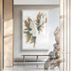 A modern art gallery displays a large abstract painting with textured white, brown, and gold layers above a wooden bench. In the foreground is the Lirien Pearl Fade Teal & Gold Sculptural 3D Wall Art by Giant Sculptures.