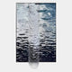 A layered silver chain necklace is displayed on a rectangular background with a rippling, abstract pattern, echoing the fluid elegance of Giant Sculptures' Tidefall Midnight Blue Waters Acrylic & Crystal Beads 3D Wall Art.