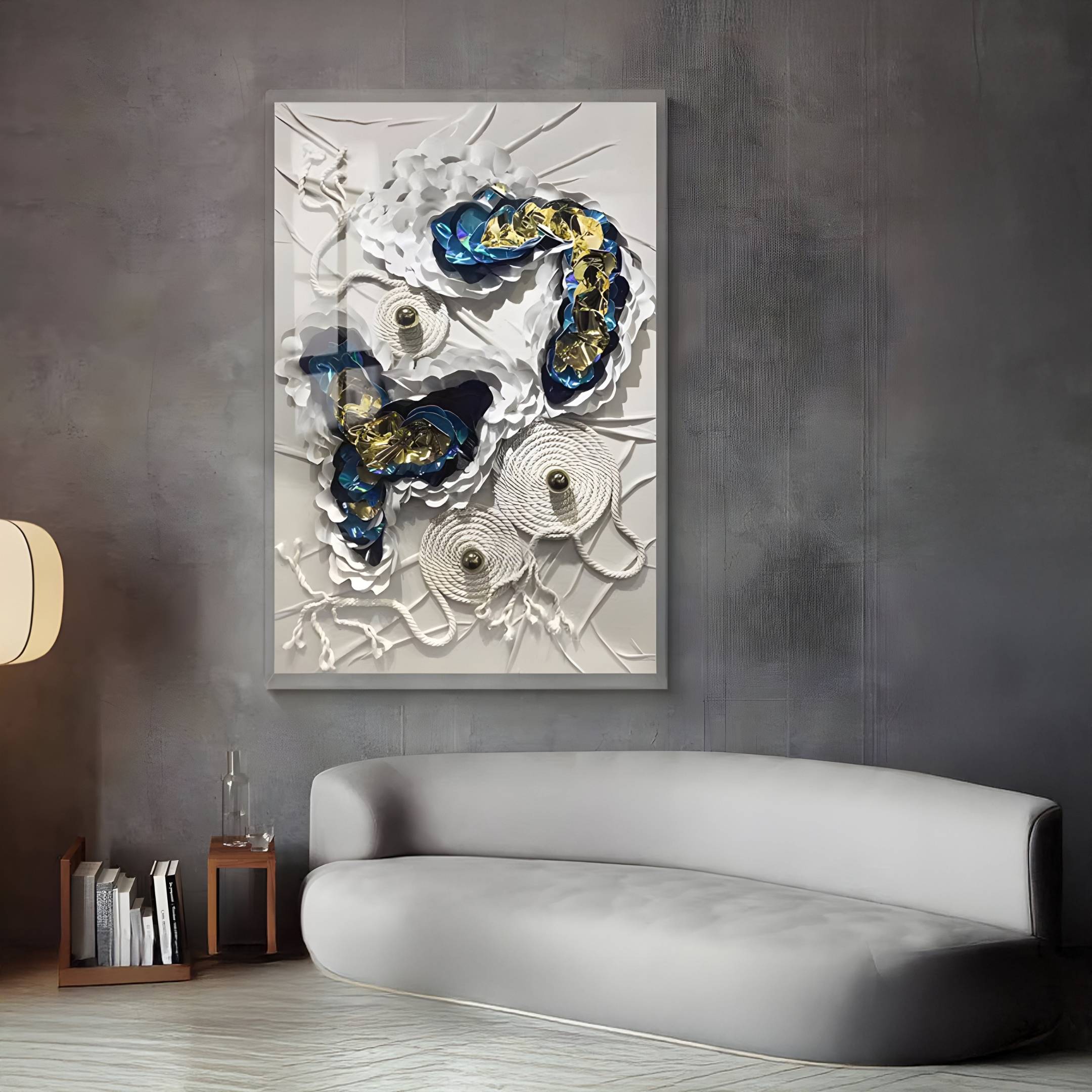 A modern living room with a curved light gray sofa, a round floor lamp, and Giant Sculptures’ Pearlash Coral Nest Mixed Media 3D Wall Art showcasing textured white, blue, and gold forms on a gray wall.