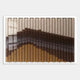 The Tessera Caramel & Walnut Gradient Acrylic 3D Wall Art by Giant Sculptures features a chevron pattern in cream, brown, and yellow with a glossy finish that reflects light.