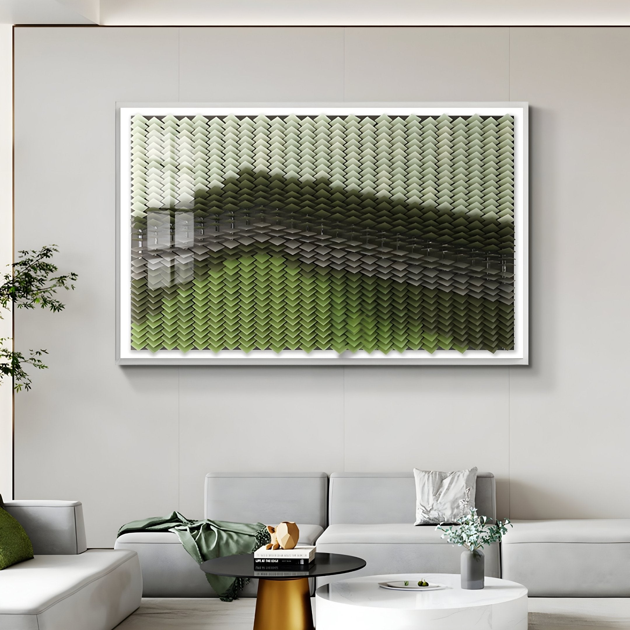 A modern living room features the Giant Sculptures Tessera Sage & Forest Green Gradient Acrylic 3D Wall Art above a light gray sectional, with a round white coffee table and a corner plant.