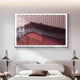 A modern bedroom featuring the Tessera Rose & Crimson Red Gradient Acrylic 3D Wall Art by Giant Sculptures above a double bed, with two pendant lamps—its textured chevron patterns in pink, purple, and red add chic style to any modern interior.