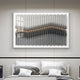 A modern bedroom with a neatly made bed in neutral tones features the Tessera Ash Grey & Warm Sandline Acrylic 3D Wall Art by Giant Sculptures, showcasing layered zigzag patterns in gray, black, white, and elegant gold accents.