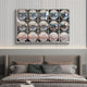 A modern bedroom features a neatly made bed beneath the Reflect Misty Rose & Storm Blue Mirror Acrylic 3D Wall Art by Giant Sculptures, with 15 convex mirrors on a wall-mounted shelf, adding striking sculptural style and geometric flair.