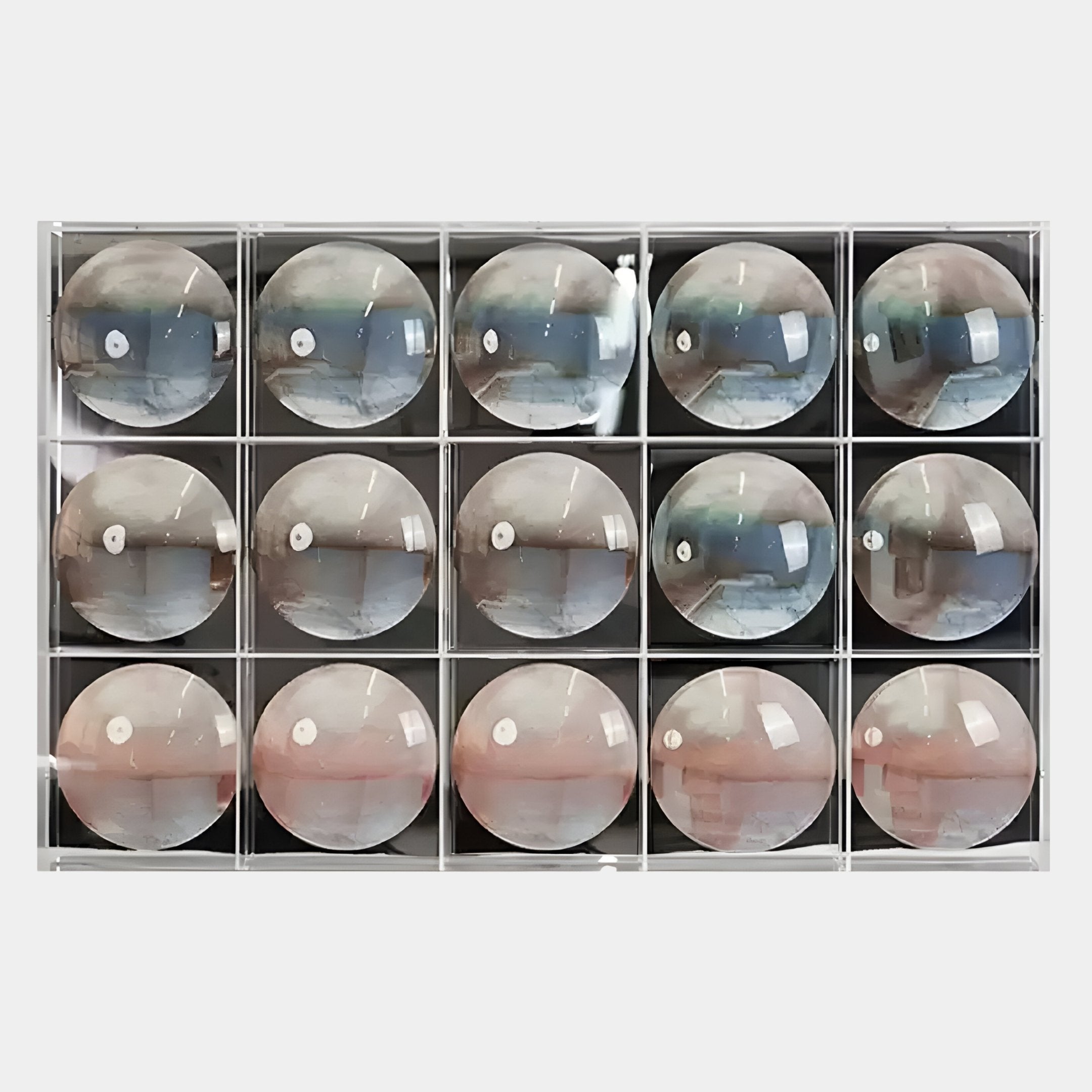 The Reflect Misty Rose & Storm Blue Mirror Acrylic 3D Wall Art by Giant Sculptures features sixteen convex acrylic mirrors, each with white dots, reflecting your space for striking modern geometric decor.