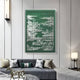 A modern living room features a gray sectional sofa with patterned pillows, a sculptural coffee table decor, and the Dynasty Forest Green Pavilion Acrylic 3D Wall Art by Giant Sculptures with intricate white designs hanging behind the sofa.