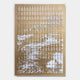 The Dynasty Golden Cliffs Acrylic 3D Wall Art by Giant Sculptures features vertical-cut tan acrylic that creates sculptural wall decor, revealing a detailed landscape with mountains, trees, and water in white and brown tones.