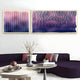 A modern living room with a dark purple sectional sofa, white round coffee table, vases of dried flowers, and two Giant Sculptures Current I Rose Plum & Midnight Purple Acrylic 3D Wall Art pieces hanging on a white wall.