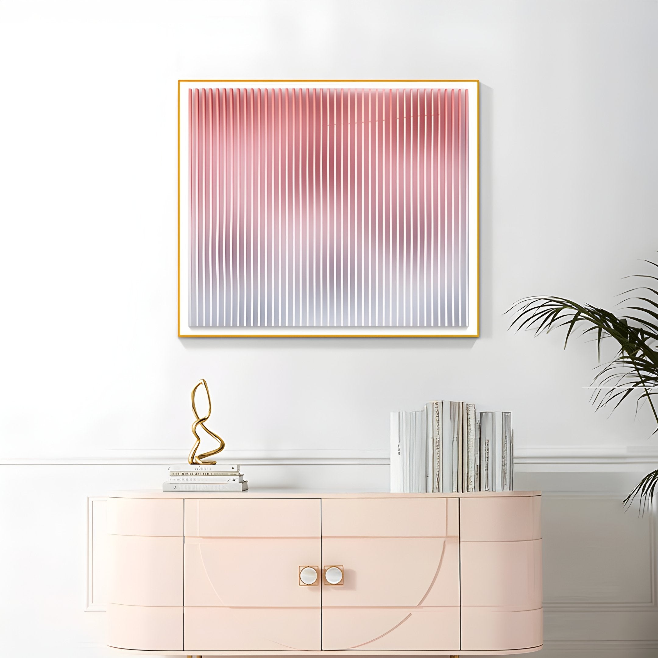 The Current III Blush Coral & Snow White Acrylic 3D Wall Art by Giant Sculptures hangs above a light pink cabinet, with a gold sculpture, small book, and plant on the right for a fresh, modern look.