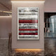 The Rhythm Crimson & Silver Layered Stripe Leather 3D Wall Art by Giant Sculptures features bold red, white, and black stripes and hangs on a beige wall in a modern interior with marble flooring and minimalistic decor.