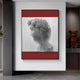 The Edge Deep Crimson David Bust Leather & Acrylic 3D Wall Art by Giant Sculptures features a modern David profile formed by vertical lines with bold red accents, while a brown bear figurine on the shelf below complements the decor.