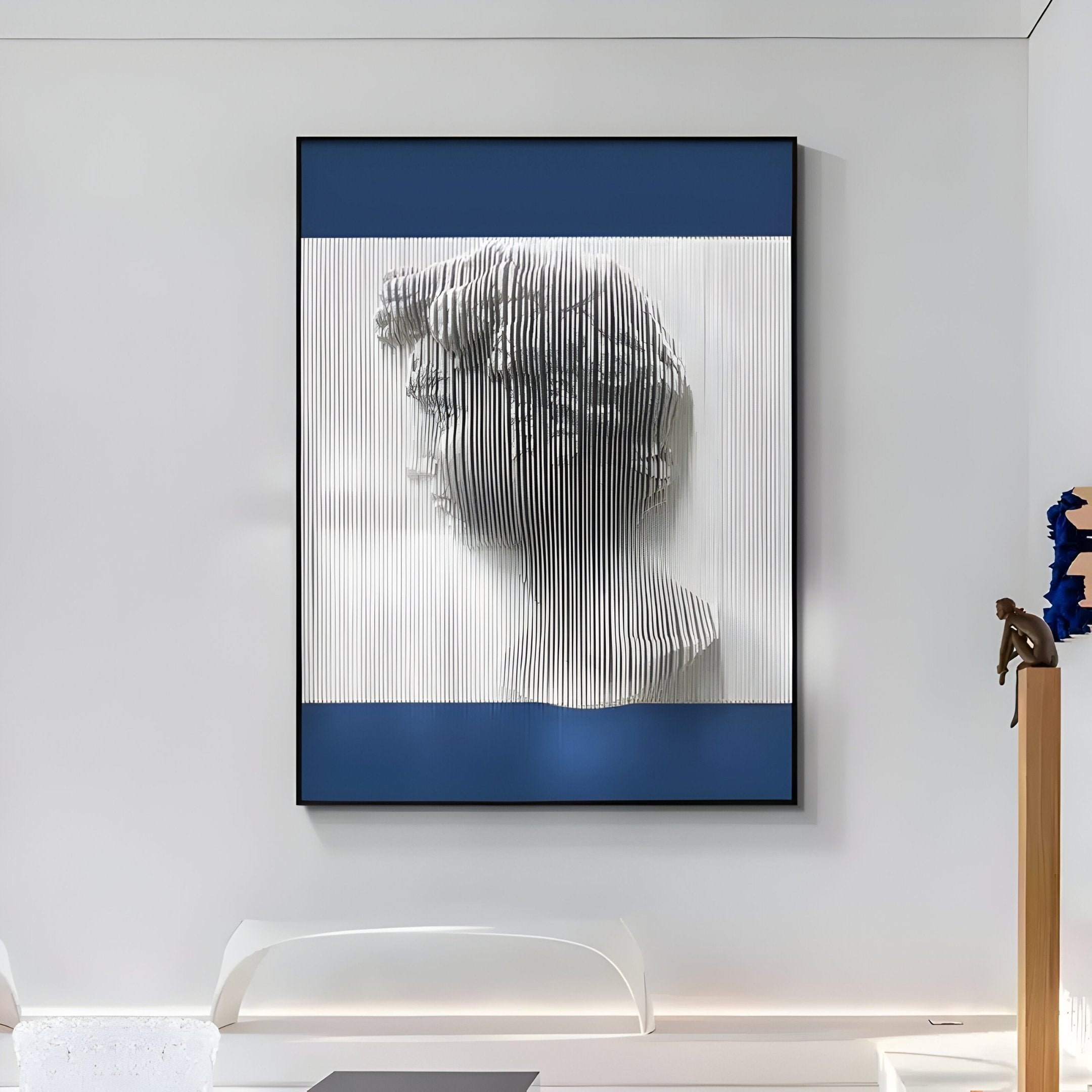 Edge Royal Blue David Bust Leather & Acrylic 3D Wall Art by Giant Sculptures features a classical David bust in profile, textured with vertical white lines on a blue and white background—ideal modern decor for minimalist white walls.