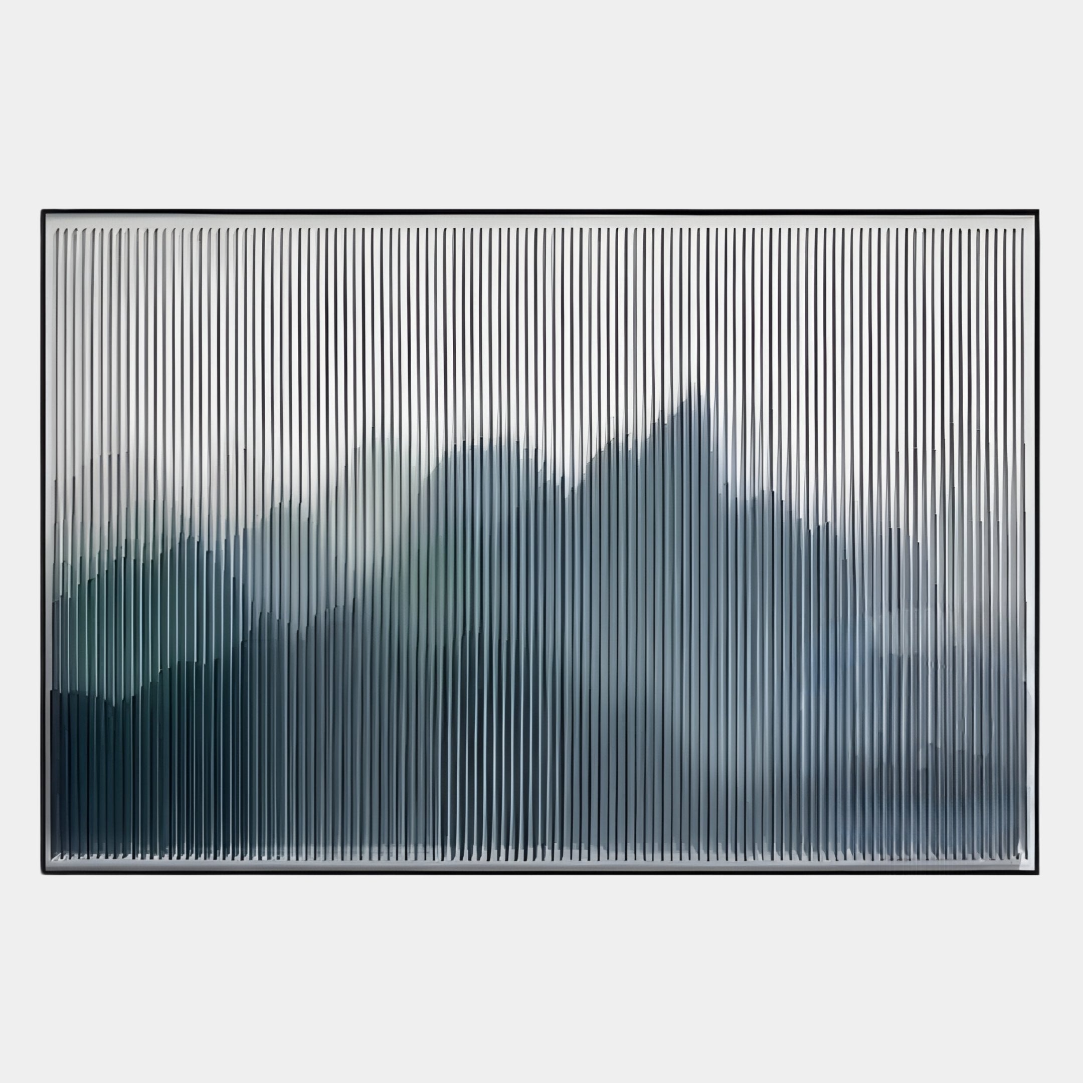The Horizon I Slate Mist Mountain Acrylic 3D Wall Art by Giant Sculptures features a rectangular minimalist landscape with vertical, evenly spaced white lines that blur blue and gray mountains for an abstract, layered look.