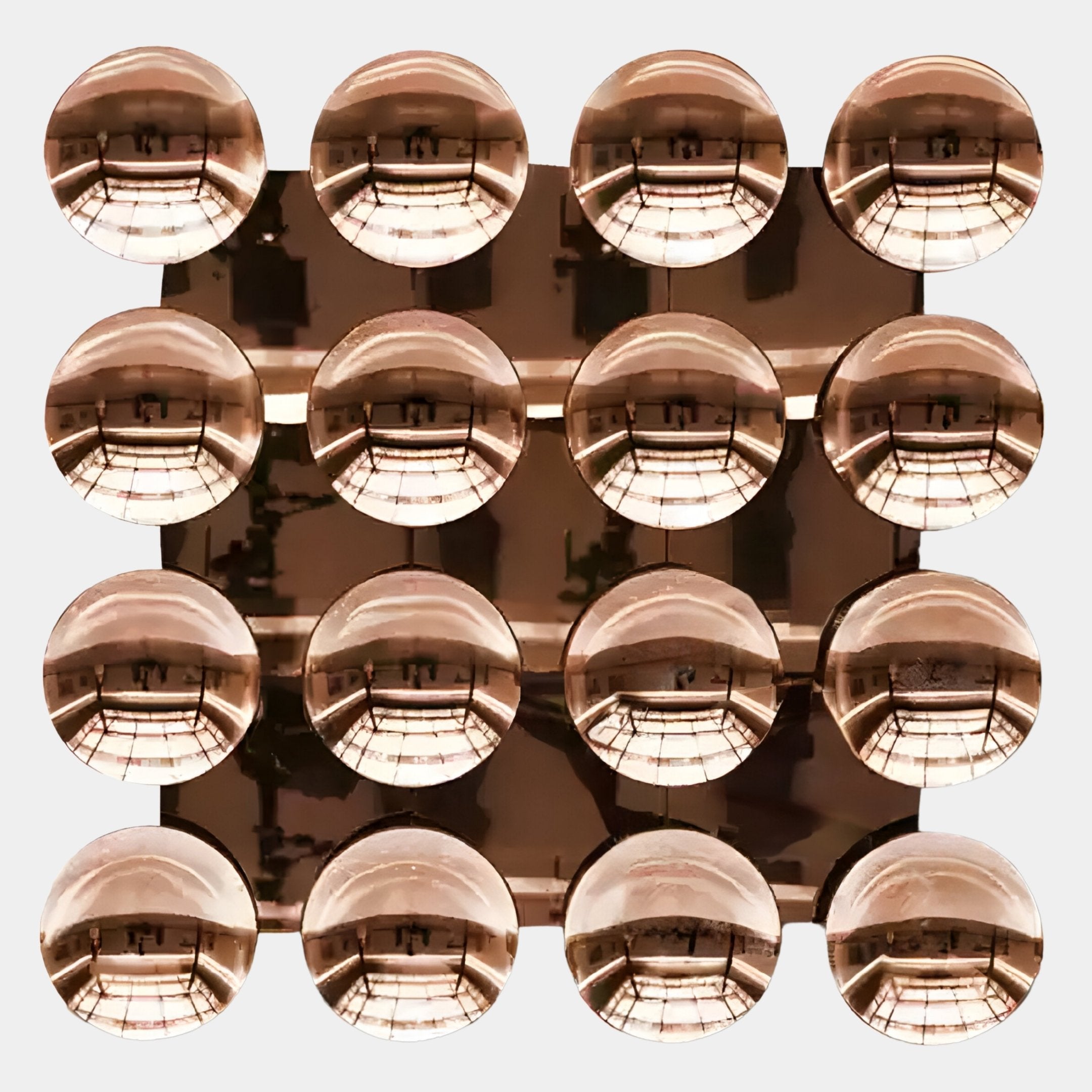 The Dome Burnished Copper Acrylic 3D Wall Art by Giant Sculptures features sixteen reflective spheres in a four-by-four grid on a metallic base, creating a striking wall piece that mirrors room details and ambient lights.