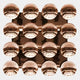 The Dome Burnished Copper Acrylic 3D Wall Art by Giant Sculptures features sixteen reflective spheres in a four-by-four grid on a metallic base, creating a striking wall piece that mirrors room details and ambient lights.