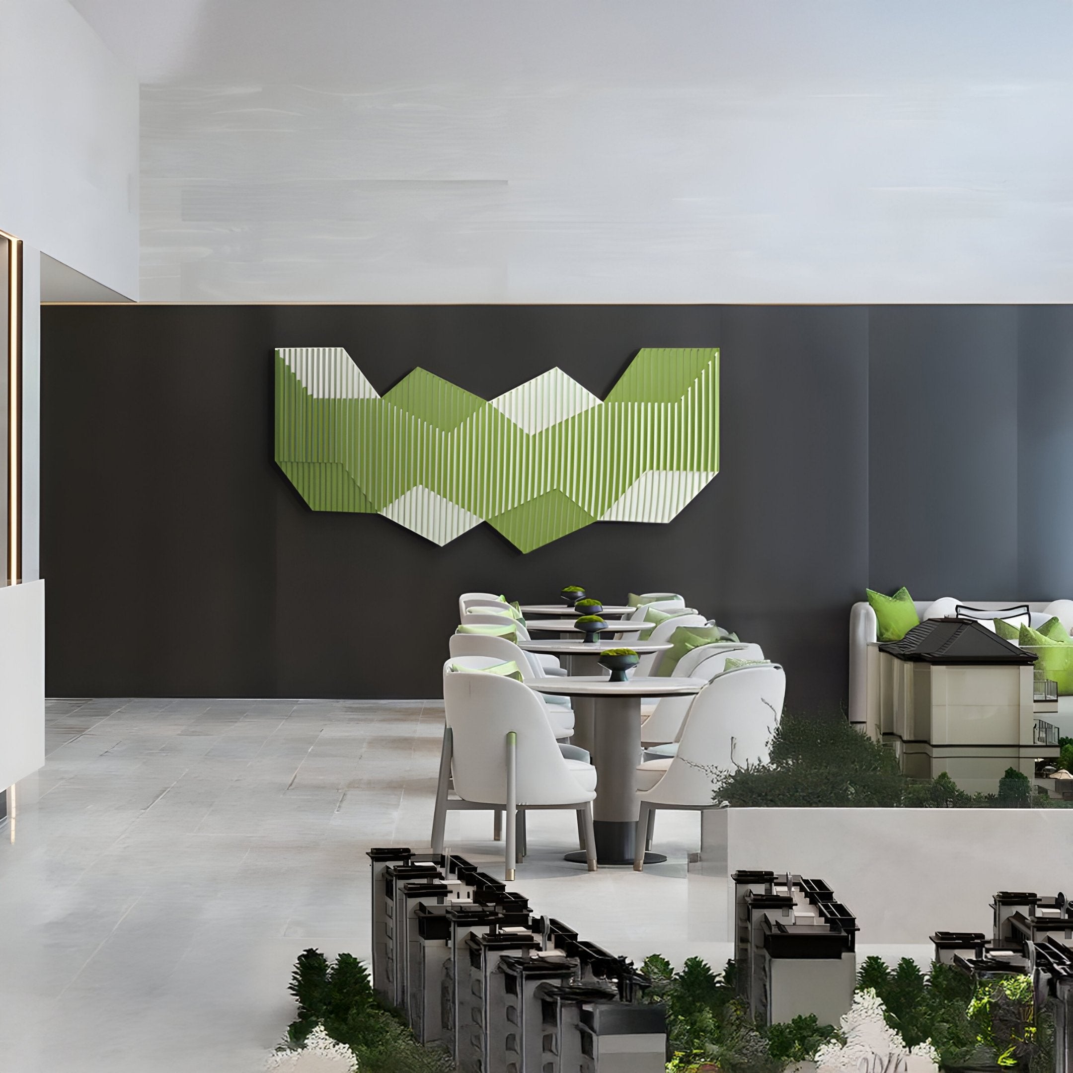 A modern dining area features white chairs, round tables, a dark accent wall, and striking geometric decor. The Vertex Green & Pale Mint Ridge 3D Wall Art by Giant Sculptures adds a fresh, contemporary touch with its green and white palette.