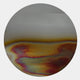 Iridia Halo I Abstract Acrylic UV Wall Art by Giant Sculptures, a circular high-gloss disc with iridescent gold, copper, pink, and green halo on grey.