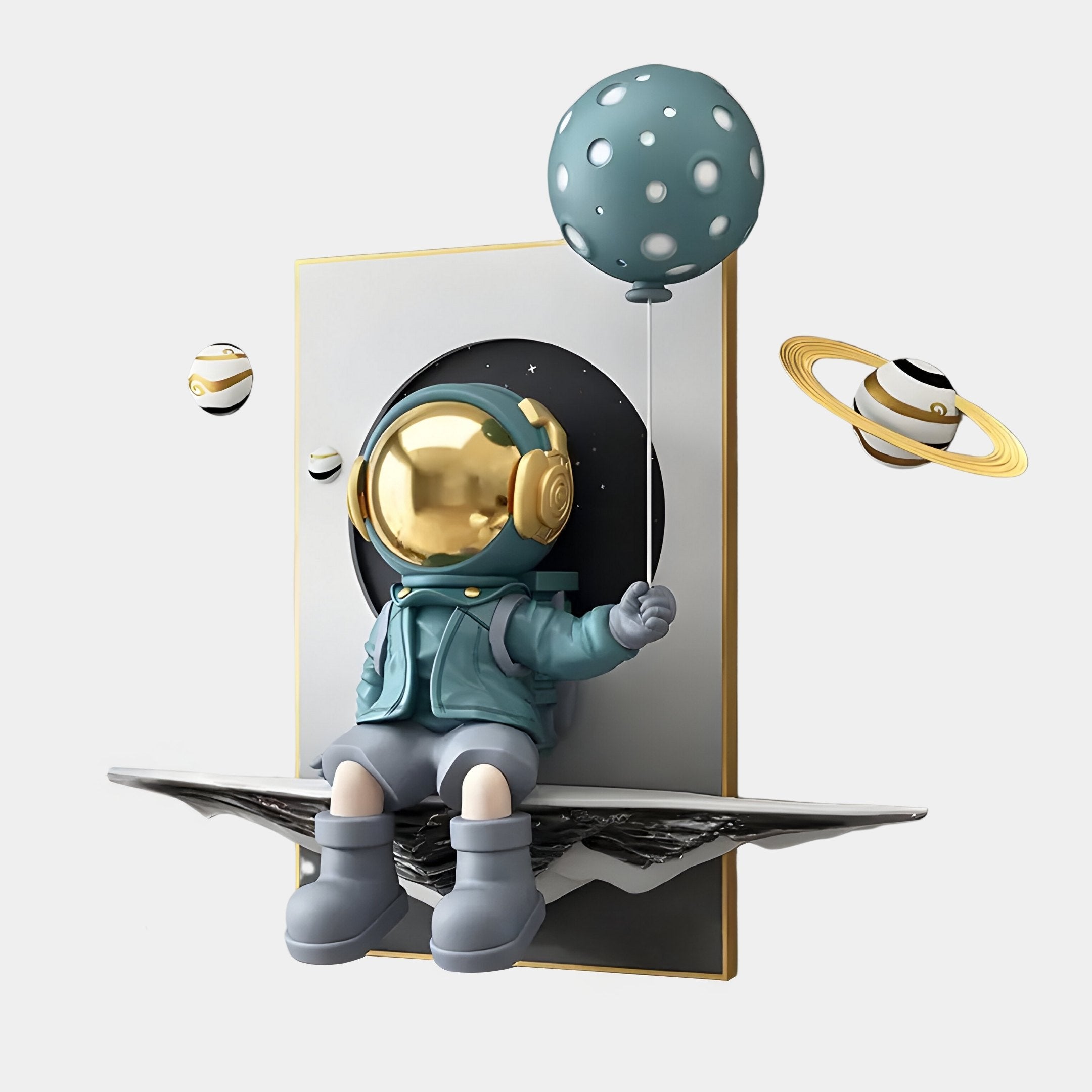 The Blue Balloon Astronaut 3D Portal Wall Art by Giant Sculptures features an adorable astronaut with a gold helmet sitting on a book edge, holding a blue balloon with white dots. Surrounding miniature ringed planets enhance the whimsical cosmic décor and space theme.