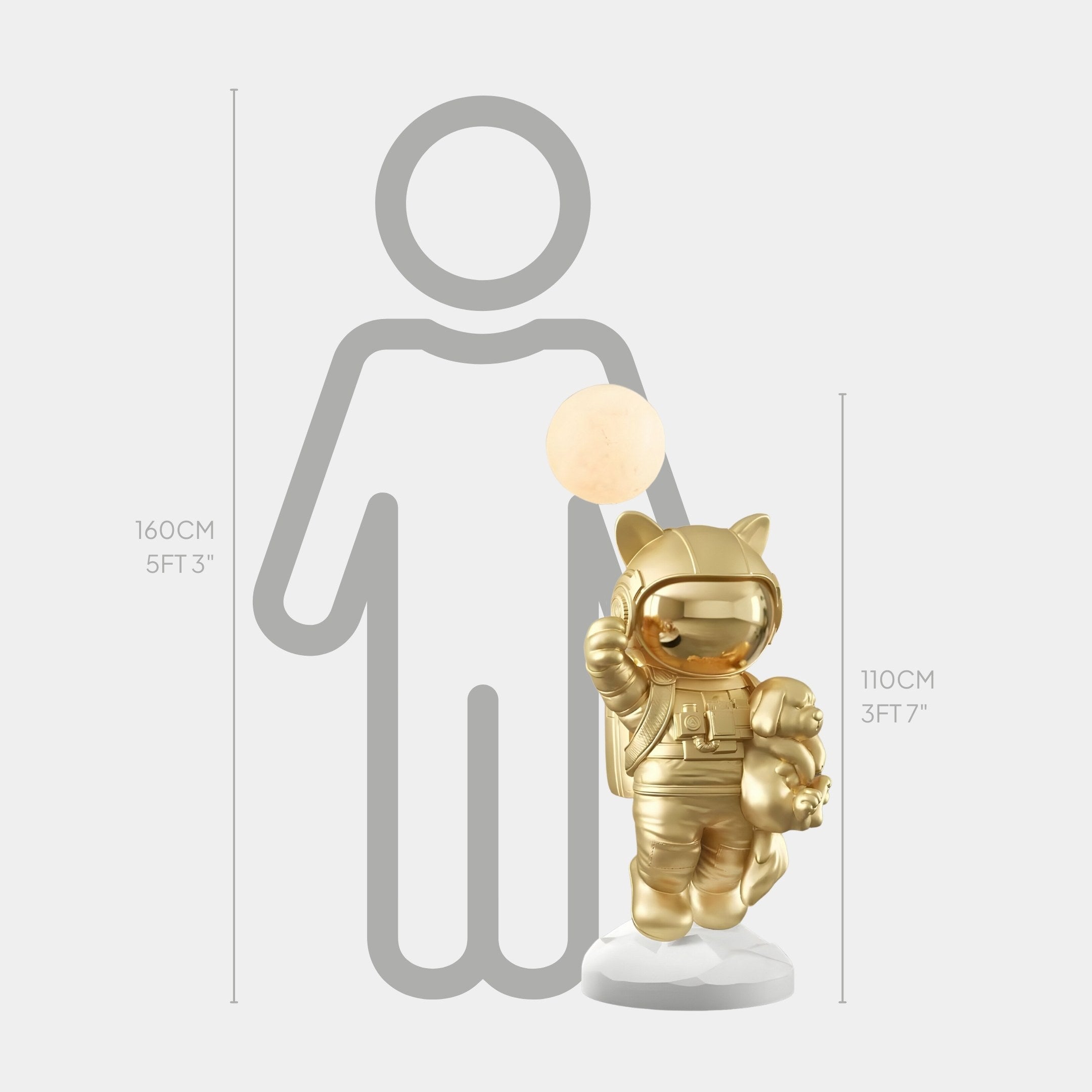 The Gilded Gold Astronaut Kitty Pup Glow Balloon Sculpture by Giant Sculptures, standing 110cm (3ft 7in) tall, resembles a cosmic lamp on a base. Its next to a silhouette of a person with height markings at 160cm (5ft 3in).