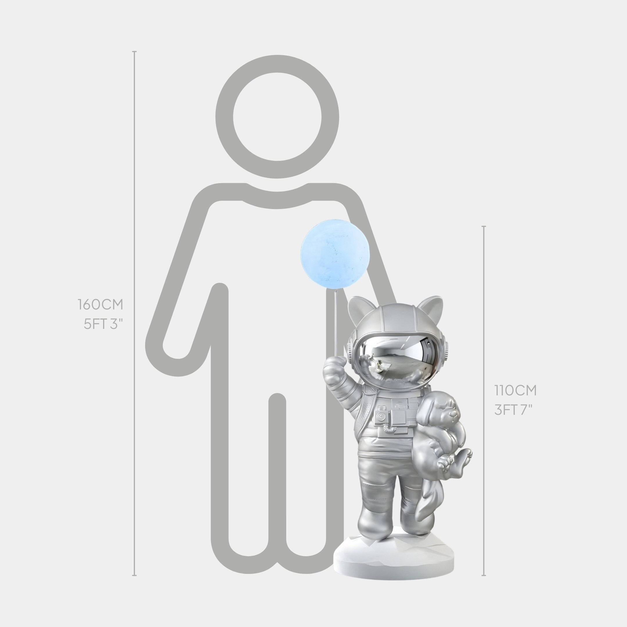 The Cosmic Chrome Astronaut Kitty Pup Glow Balloon Sculpture by Giant Sculptures features a shiny silver cat in a space suit with a blue balloon, capturing the spirit of space décor. The sculpture is 110 cm (3 ft 7 in) tall, next to a 160 cm (5 ft 3 in) person outline for scale.