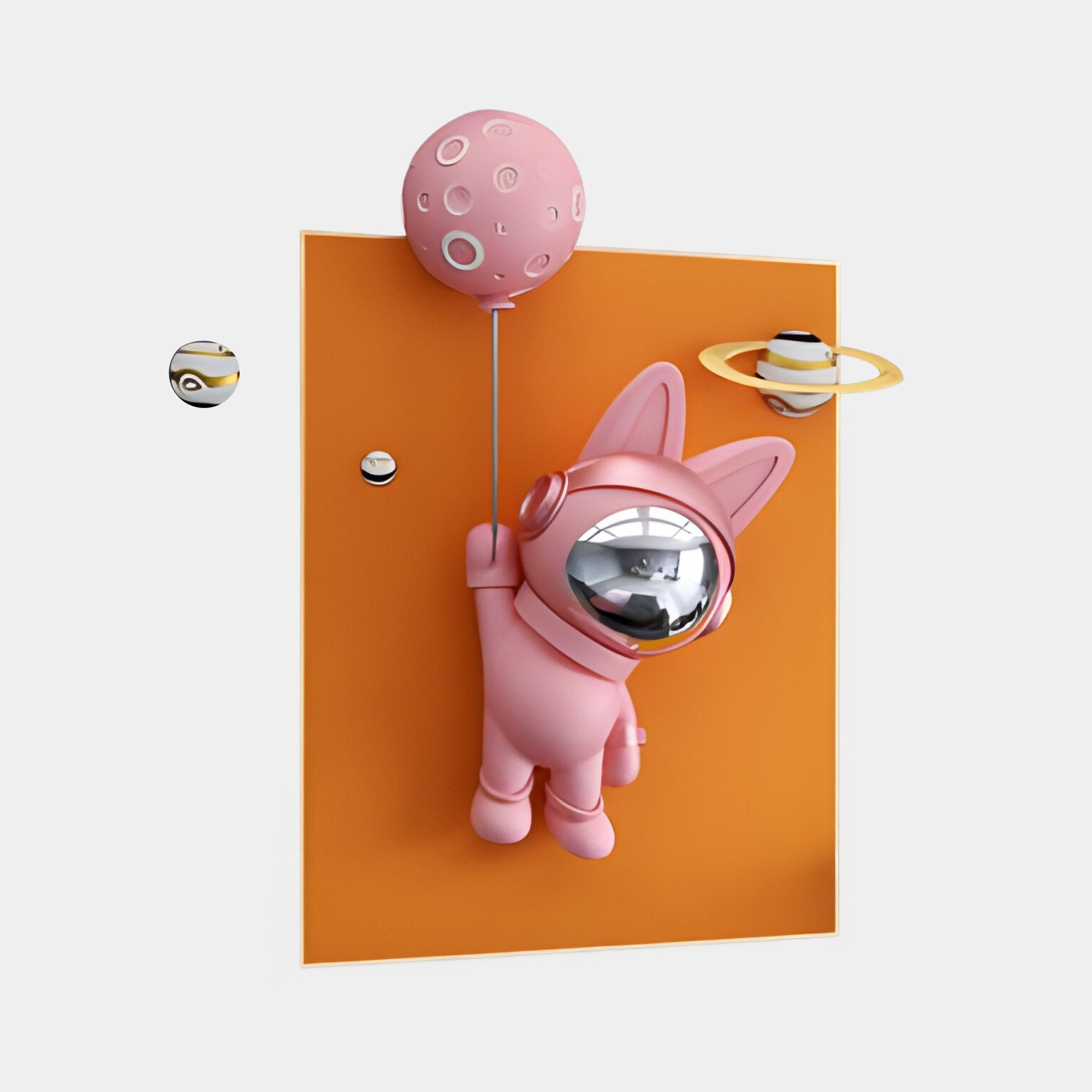 The Pink 3D Astronaut Bunny Balloon Orange Wall Art by Giant Sculptures features a charming pink bunny astronaut with bunny ears floating in space, holding a planet-like balloon against an orange backdrop dotted with planets. Its perfect cosmic inspiration for your walls.