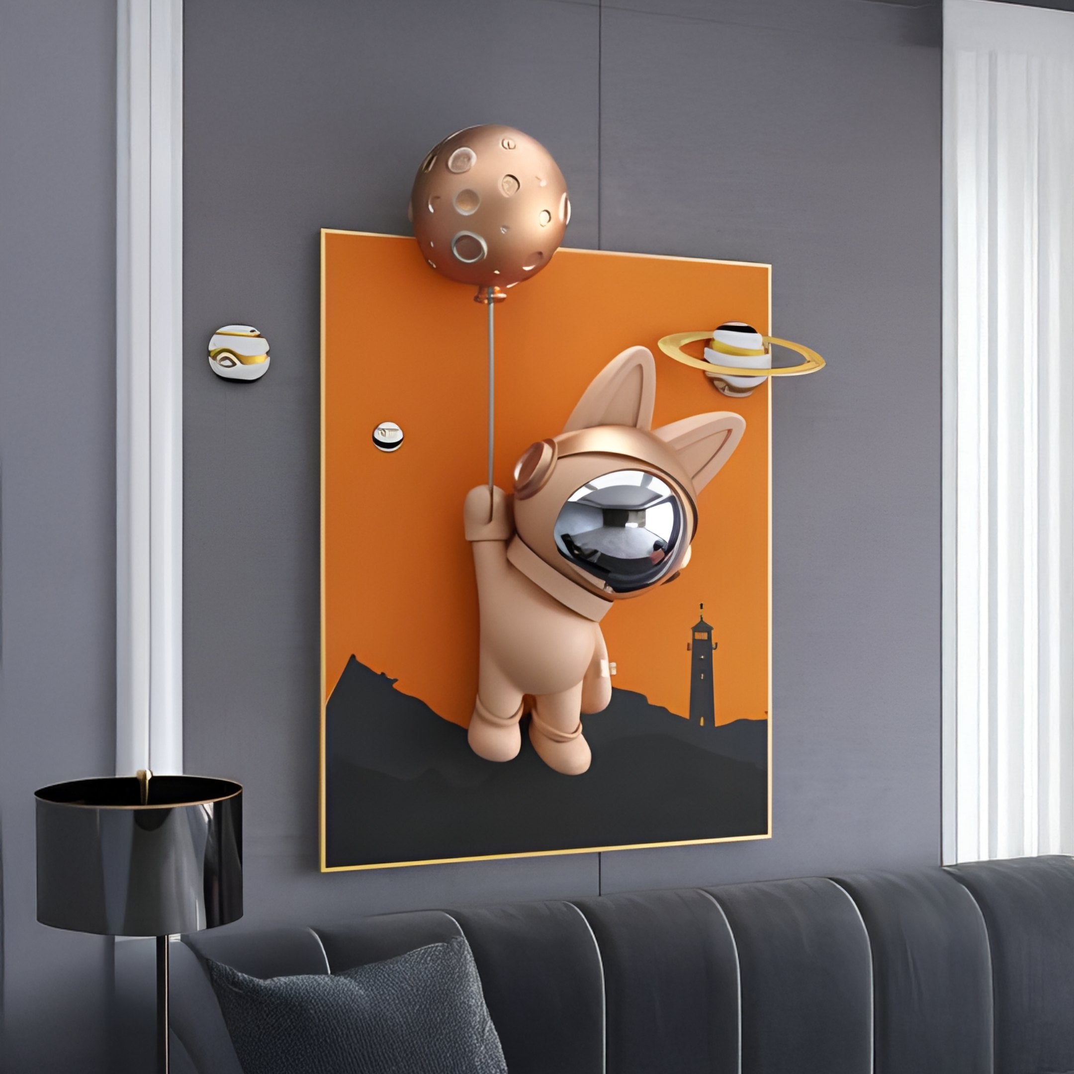 The Rose Gold 3D Astronaut Bunny Balloon Lighthouse Wall Art by Giant Sculptures features an astronaut dog in rose gold, a bunny balloon, planets, and a lighthouse silhouette on an orange backdrop. It is accented with space-themed elements like a modern black lamp and a gray sofa.