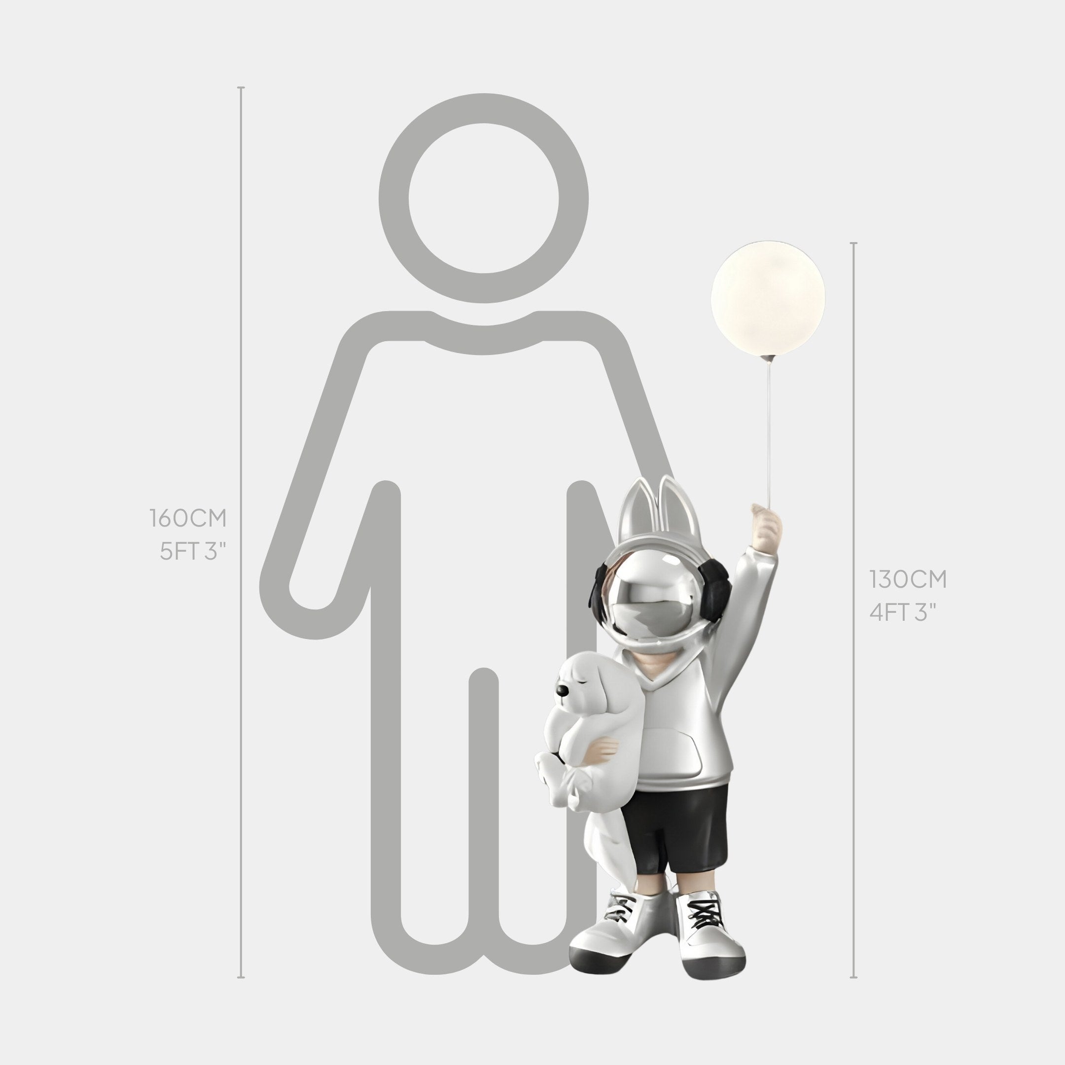 The Silver Astronaut Bunny Pup Glow Balloon Sculpture by Giant Sculptures is a 130cm space-themed décor piece featuring a helmeted and headphone-wearing bunny holding a glowing white balloon and stuffed animal, standing before a 160cm human silhouette.