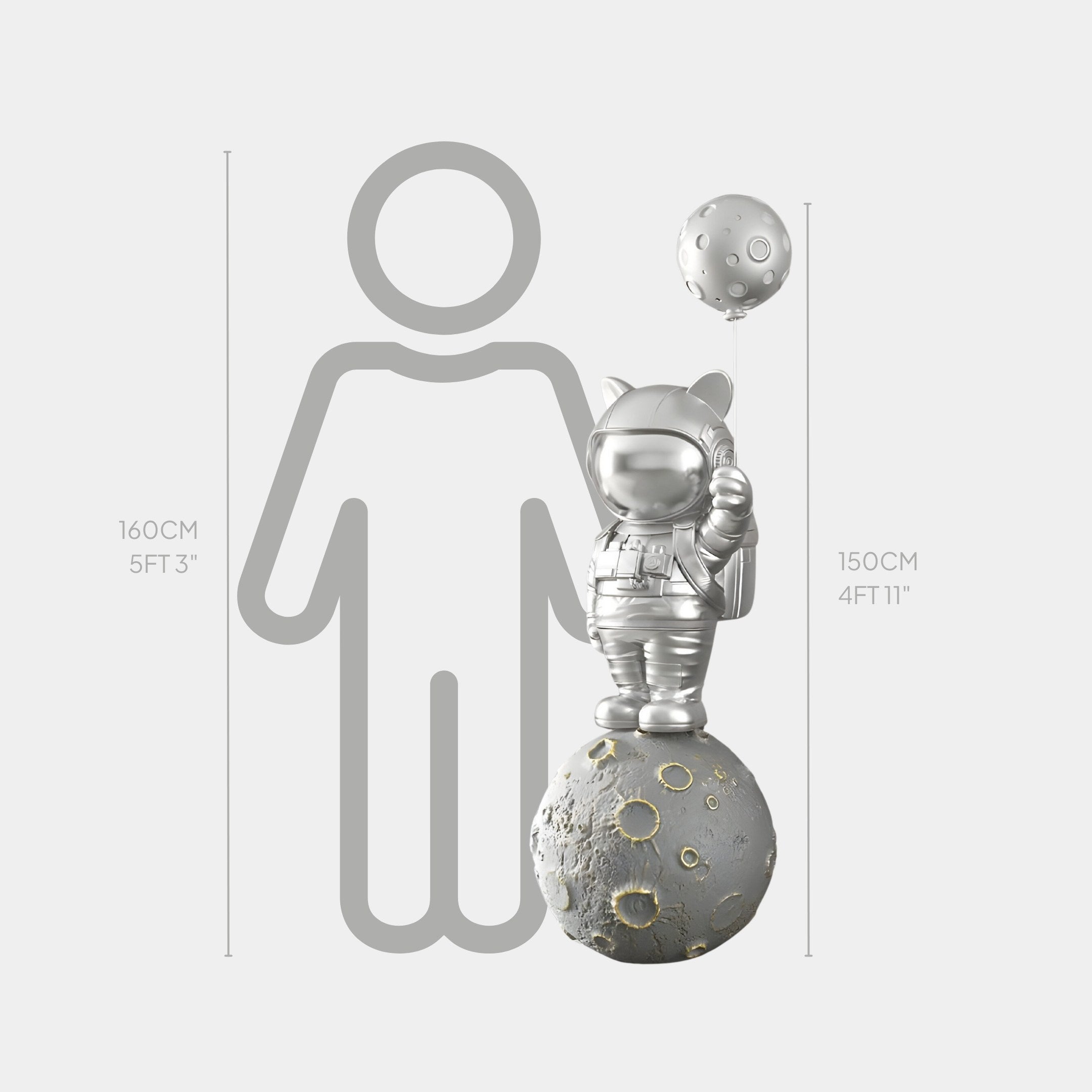 A shiny silver Giant Sculptures Cosmic Chrome Astronaut Kitty Moon Balloon Sculpture stands on a textured planetary surface. The 150 cm (4 ft 11 in) figure is next to a gray outline of a human figure labeled as 160 cm (5 ft 3 in).